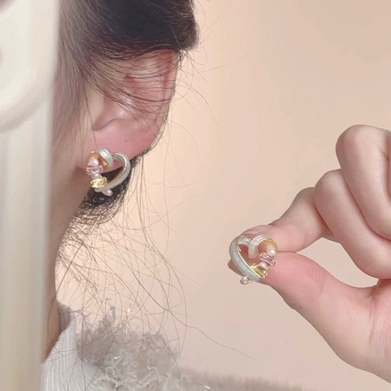 Ohrstecker mit Herz-Anhänger und Juwelenbesatz