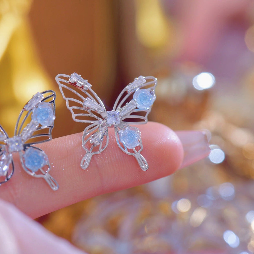 Blaue Rosen-Schmetterlings-Ohrringe