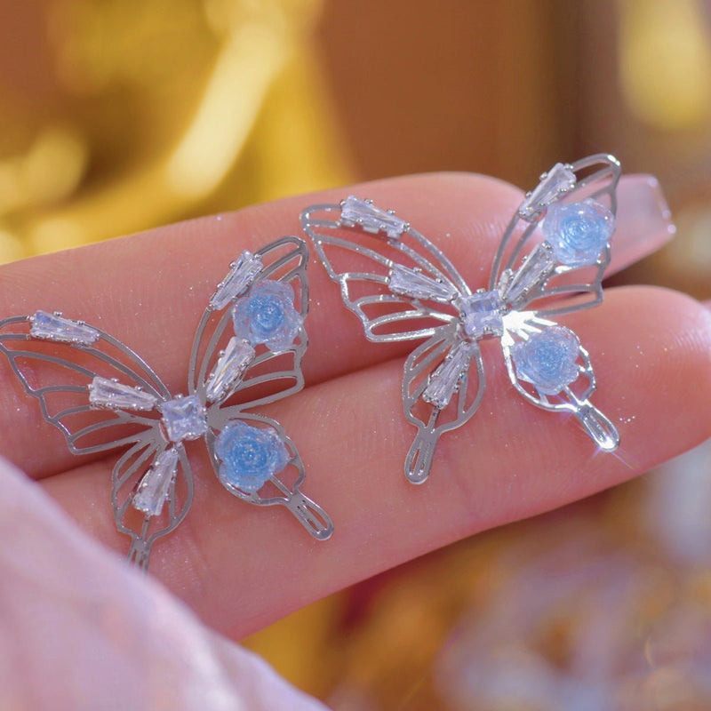 Blaue Rosen-Schmetterlings-Ohrringe
