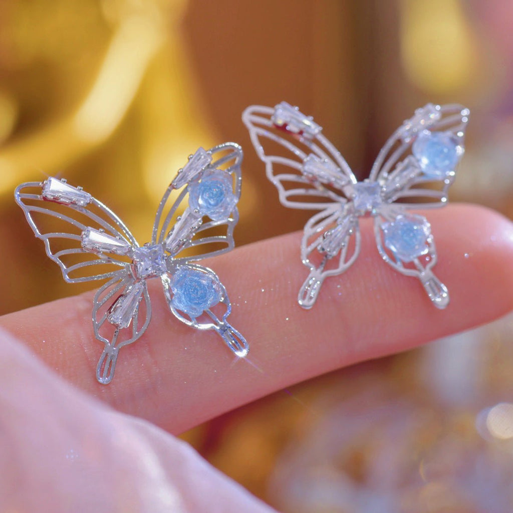 Blaue Rosen-Schmetterlings-Ohrringe