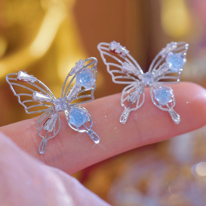 Blaue Rosen-Schmetterlings-Ohrringe