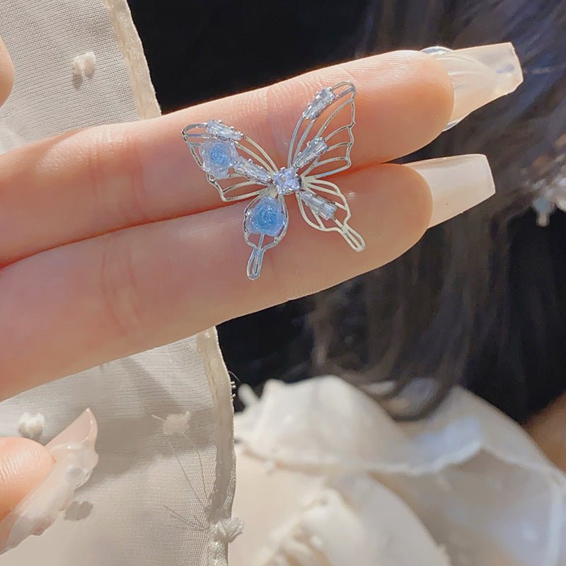 Blaue Rosen-Schmetterlings-Ohrringe