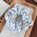 Haargummi mit blauen Streifen (3 Stile)