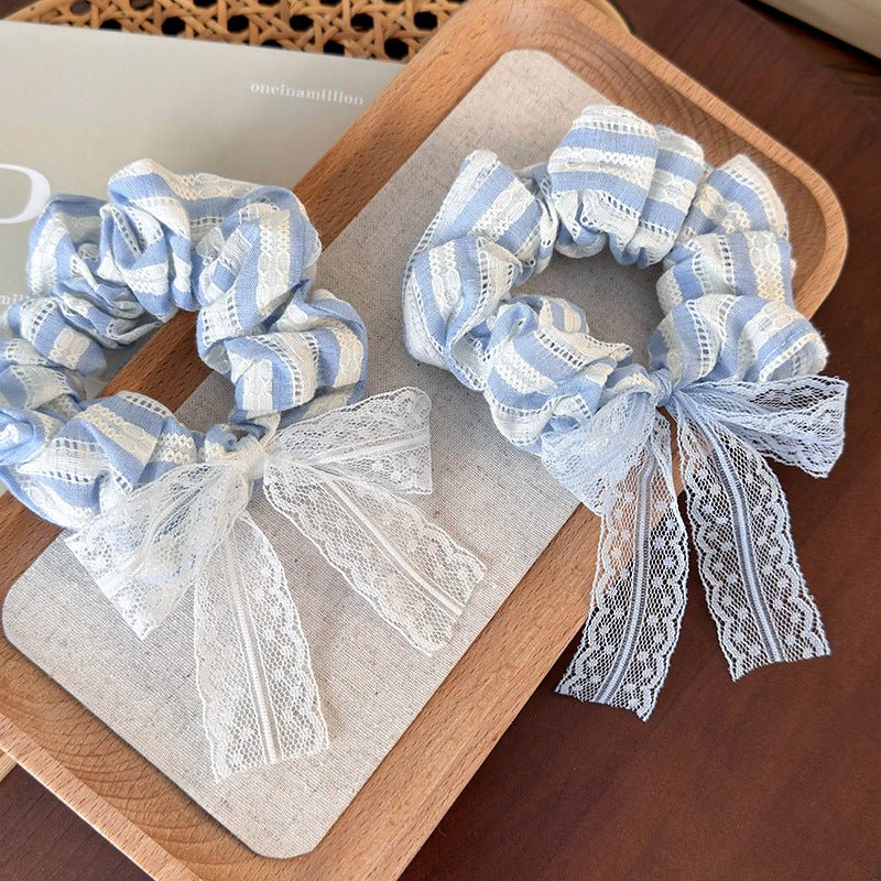 Haargummi mit blauen Streifen (3 Stile)