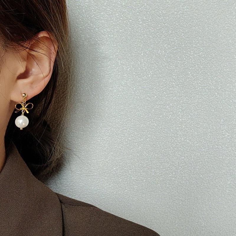 Ohrringe mit Schleife und Perle