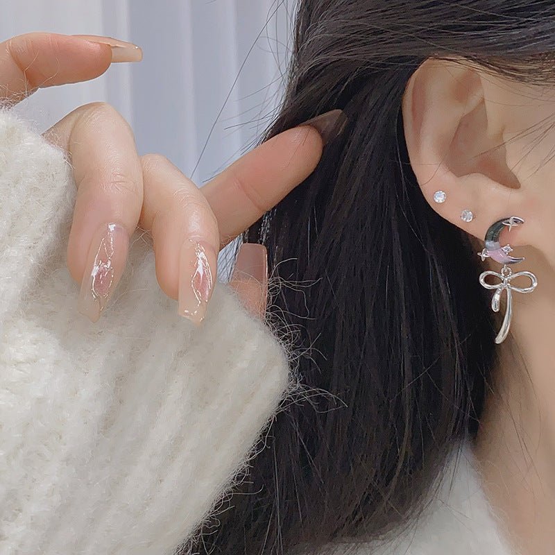 Ohrringe mit Mond und Schleife