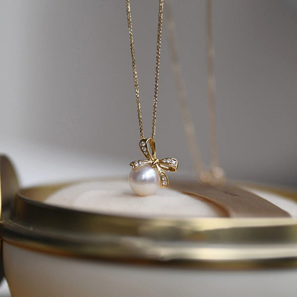 Perlenkette mit Schleife (massives Silber)