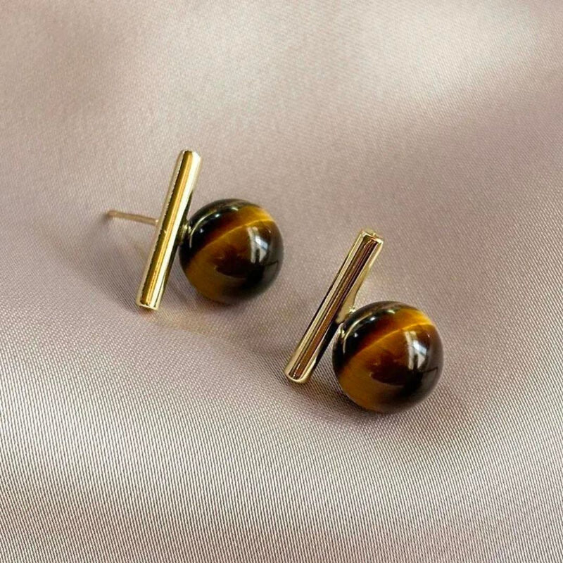 Ohrringe mit rundem Perlenanhänger