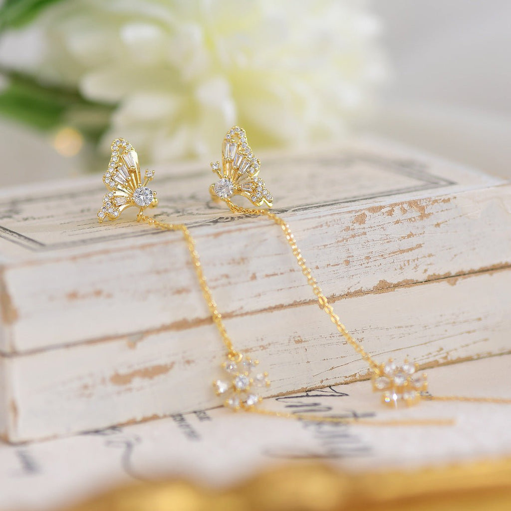 Ohrringe und Manschetten mit Schmetterlings-Einfädler