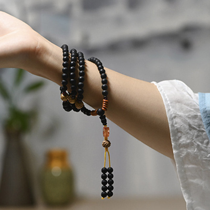 Carmiora tibetisches Mala-Zypressen-Bodhi-Samen-Heilarmband aus rotem Achat