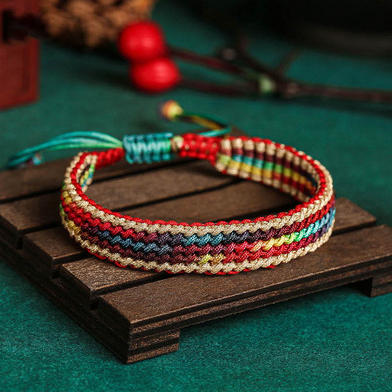 Carmiora Tibet Handgefertigtes, regenbogenfarbenes, geflochtenes Schutzarmband