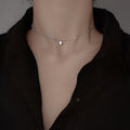 Asymmetrische Perlenkette mit Chokerhalsketten mit Glücksbringer-Anhänger