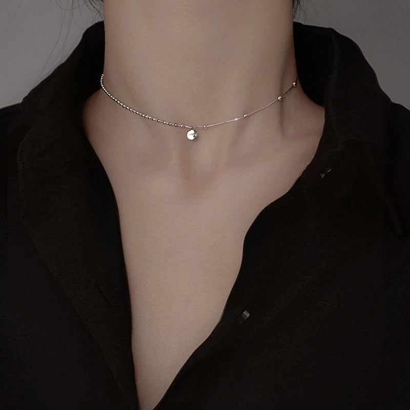 Asymmetrische Perlenkette mit Chokerhalsketten mit Glücksbringer-Anhänger