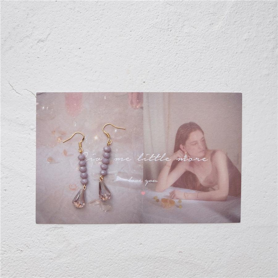 [Ausverkauf] Lila Kristallohrring