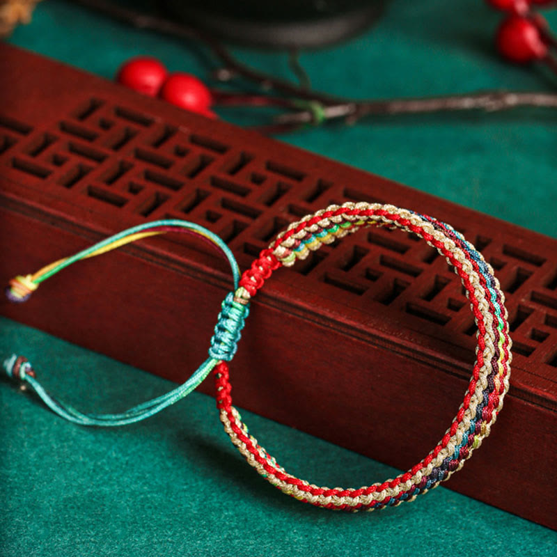 Carmiora Tibet Handgefertigtes, regenbogenfarbenes, geflochtenes Schutzarmband