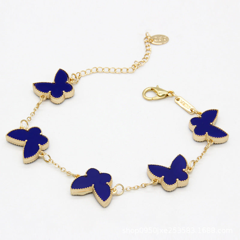 Armband mit fünf Schmetterlingen