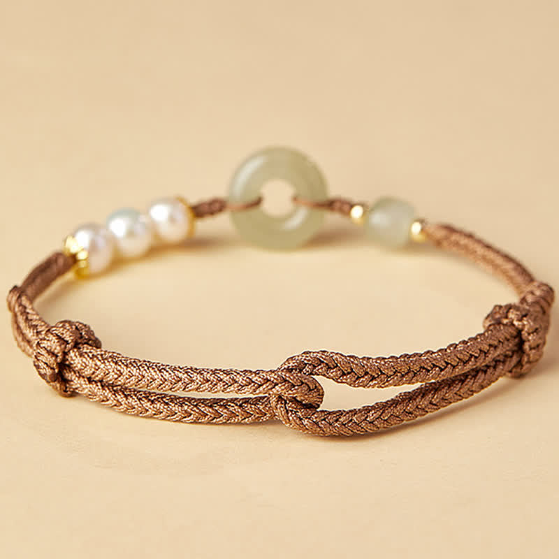 Carmiora Glücksarmband mit natürlicher Hetian-Jade-Perle und Friedensschnalle