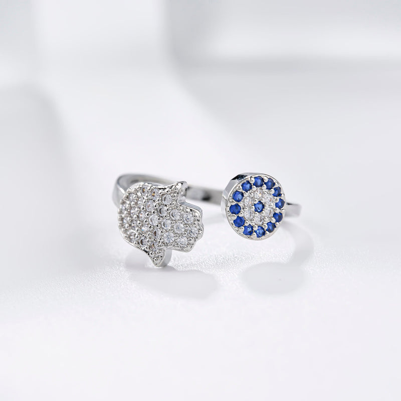 Ring mit bösem Blick und Hamsa-Hand