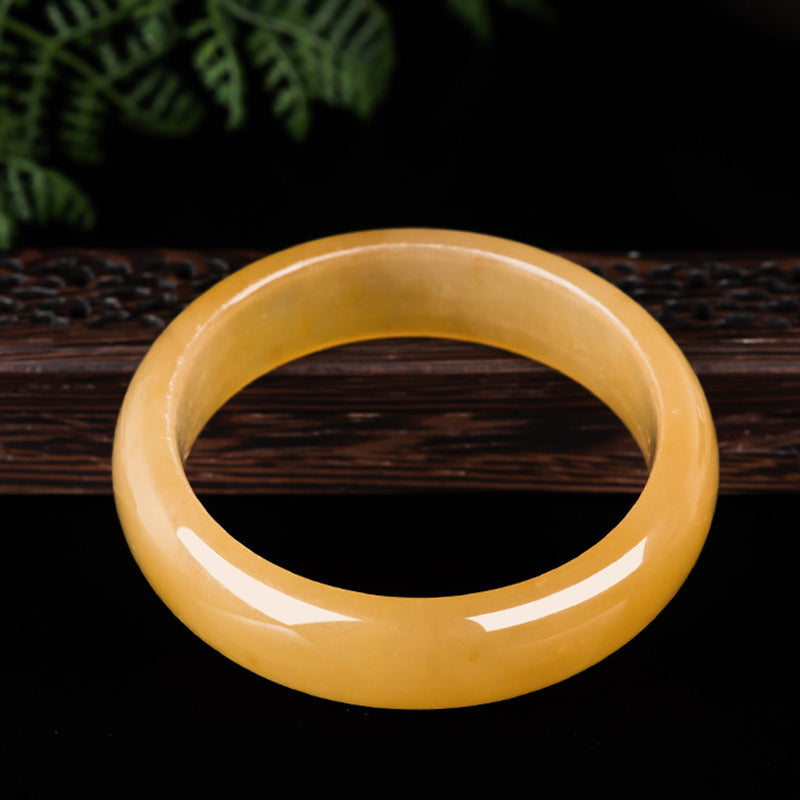 Carmiora Reichtumsarmband aus natürlicher goldener Seide und Jade