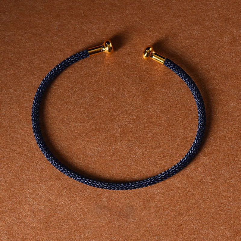 Carmiora Schlichtes Design, handgefertigtes Glücksgeflecht-Manschettenarmband