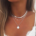 Mehrlagige Boho-Perlenkette mit Münzanhänger-Chokerhalsketten