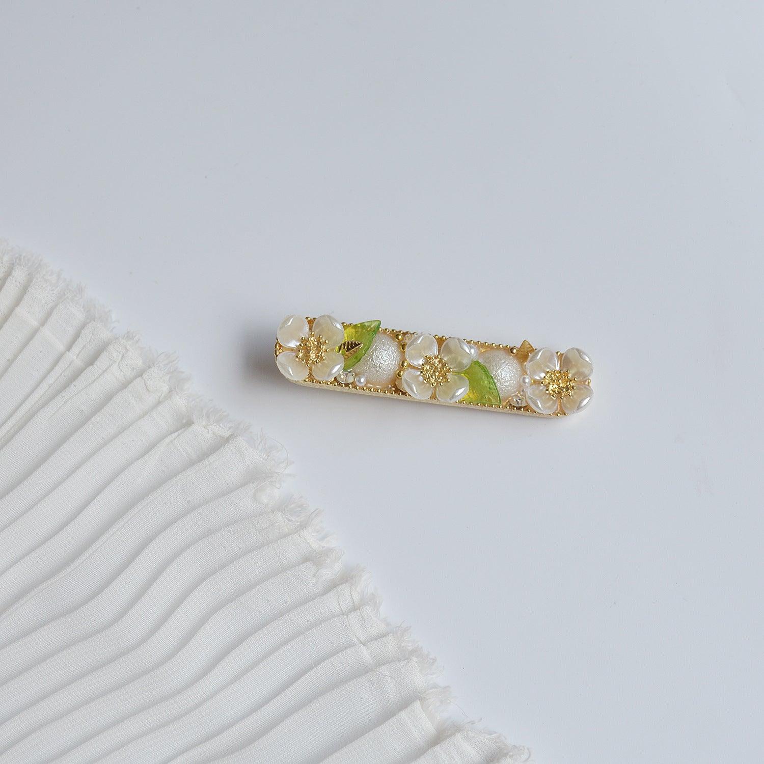 Blumenhaarspange (3 Stile)