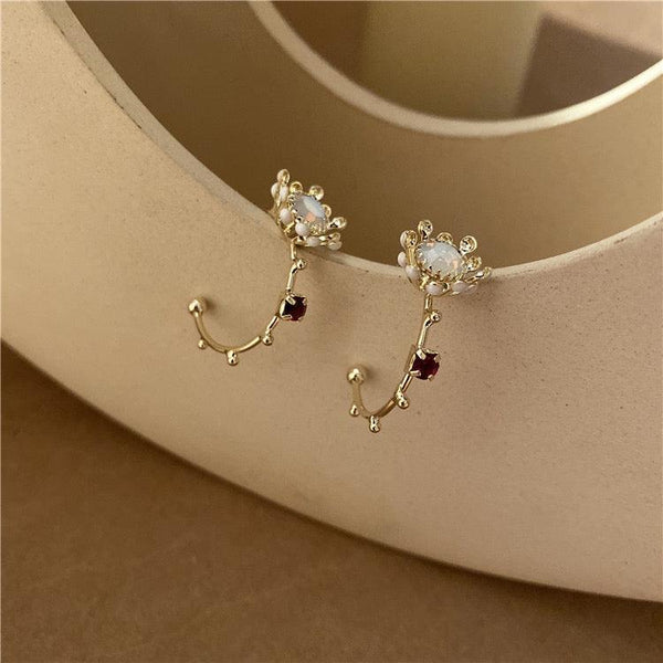 Creolen mit Blumenmotiv