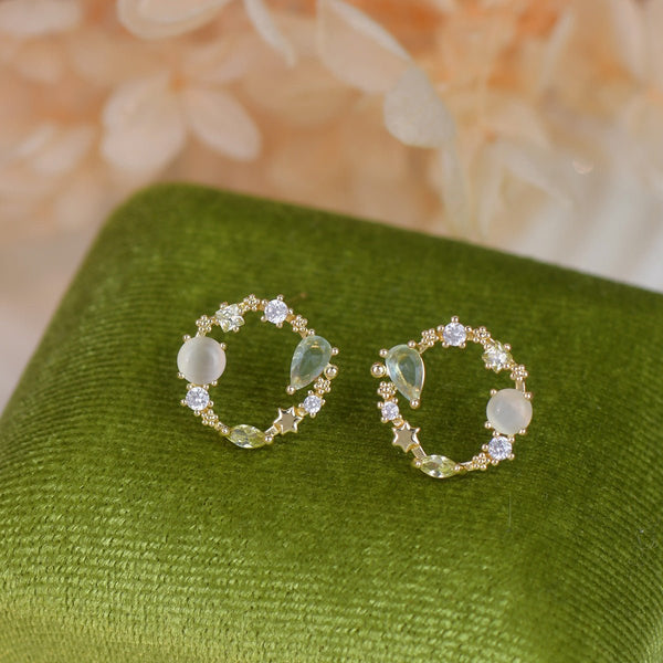 Ohrstecker mit grünen Edelsteinen