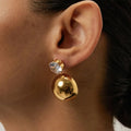 Ohrhänger mit goldenen Zirkonia-Kugeln
