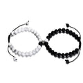 Magnetische Paararmbänder aus Howlith und mattschwarzem Achat mit schwarzem Seil