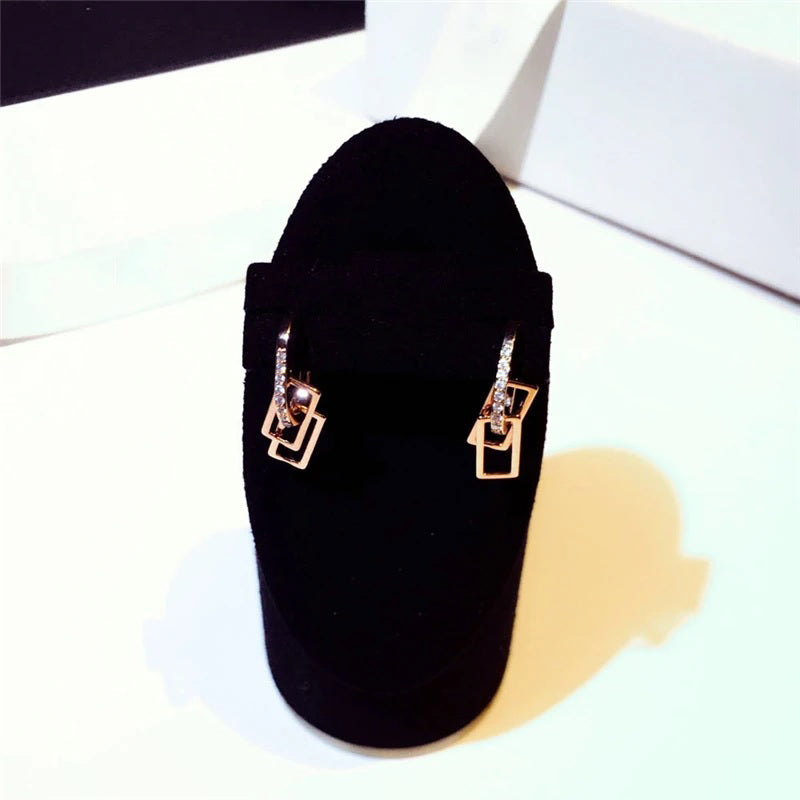 Exquisite geometrische Ohrringe mit Zirkonia