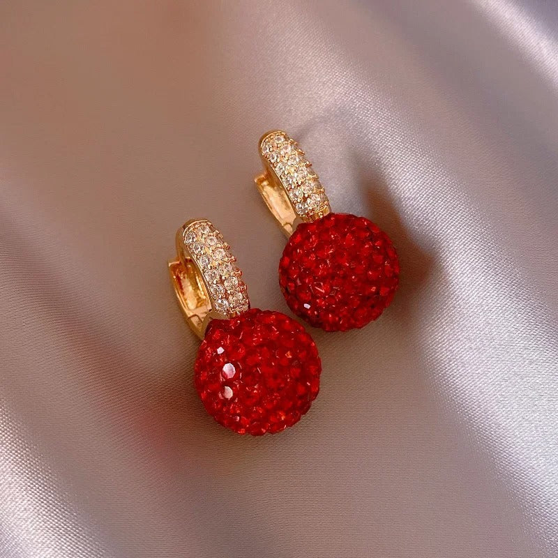 Carmiora - Schimmernde Strass-Kugel-Ohrringe