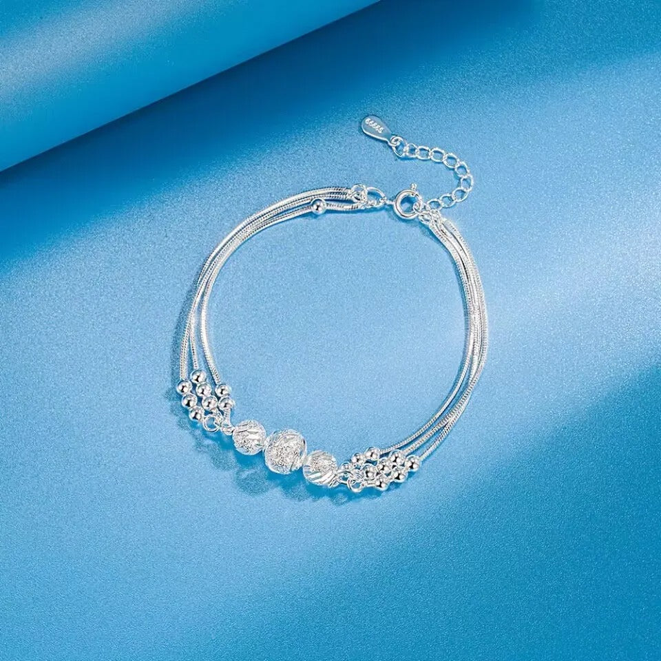 Carmiora - Glücksperlen Kettenarmband