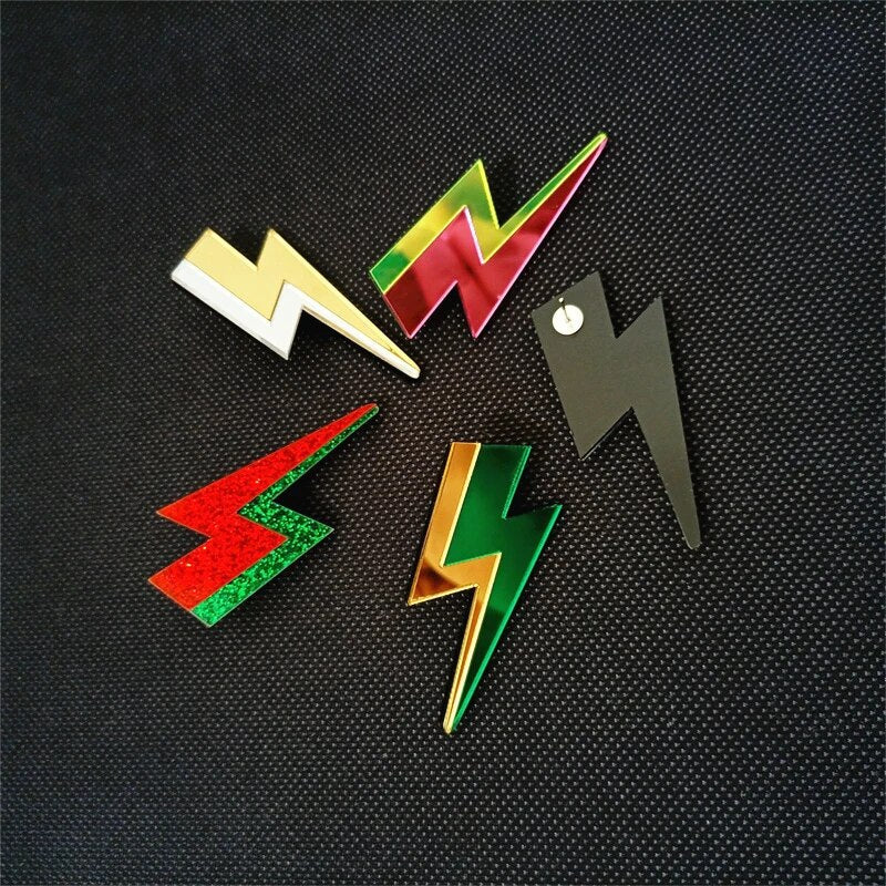 Mehrfarbige Glitzer-Ohrstecker aus Acryl mit Blitz