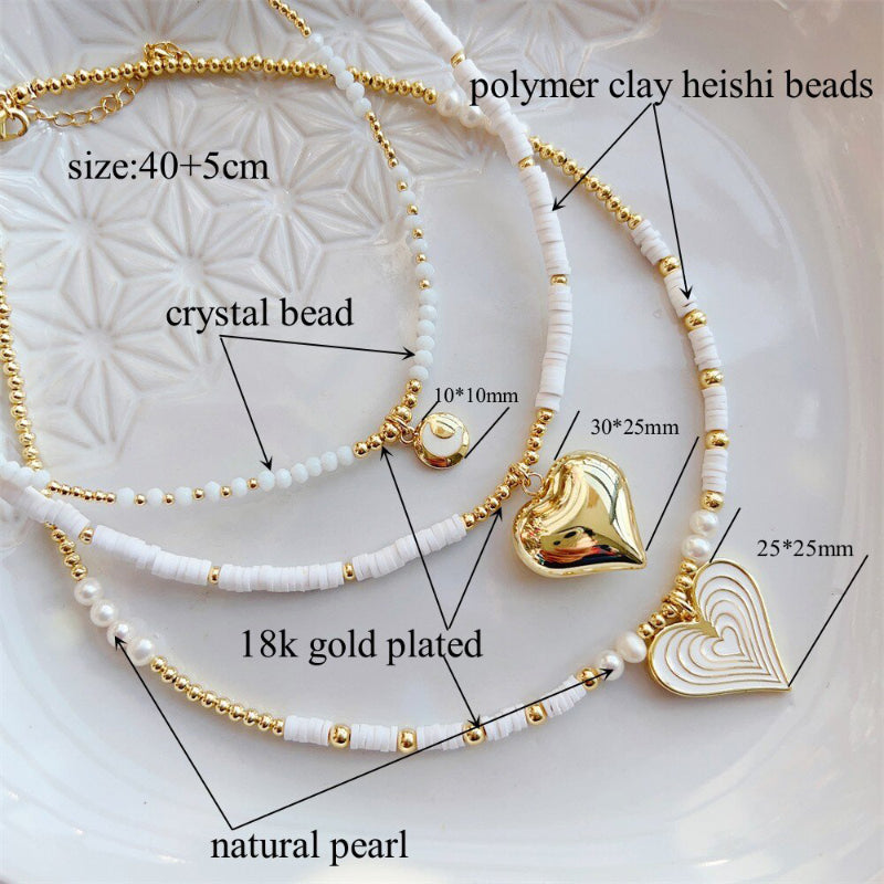 Einfache handgefertigte Perlenketten mit Herzanhänger