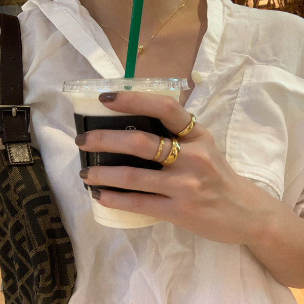 Minimalistische stapelbare Goldringe