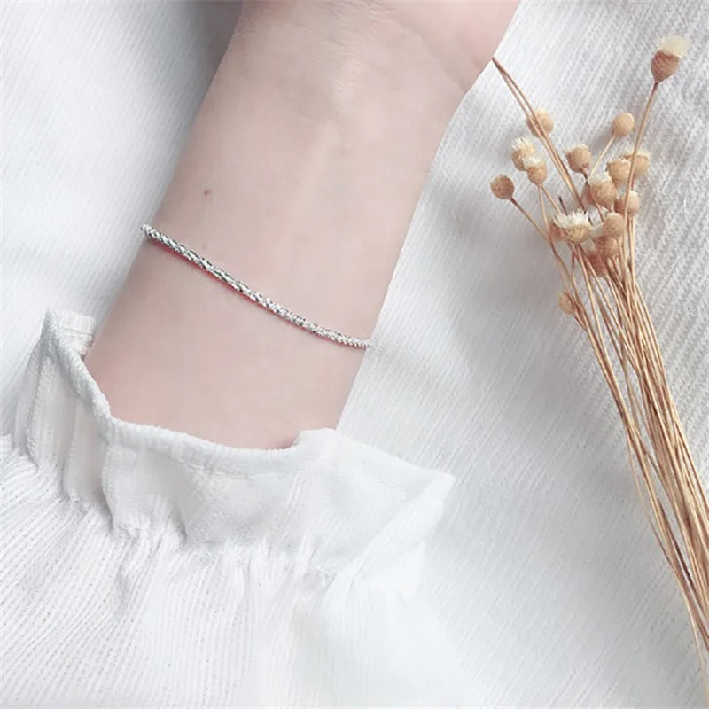 Carmiora - Schimmernde Gypsophila-Armspange