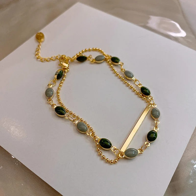 Carmiora - Perlen-Duo-Kettenarmband in Schichten