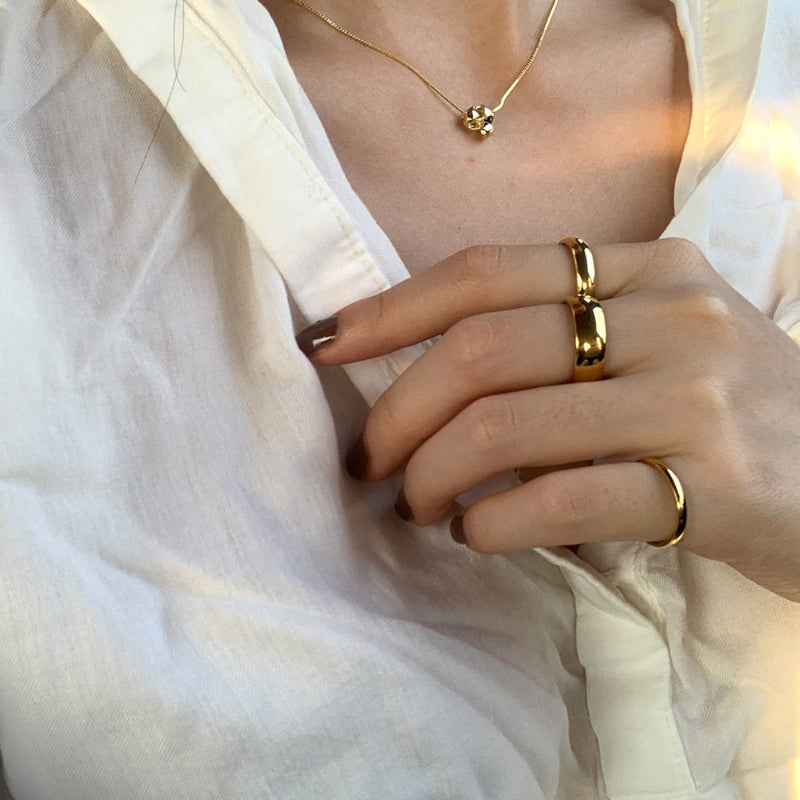 Minimalistische stapelbare Goldringe