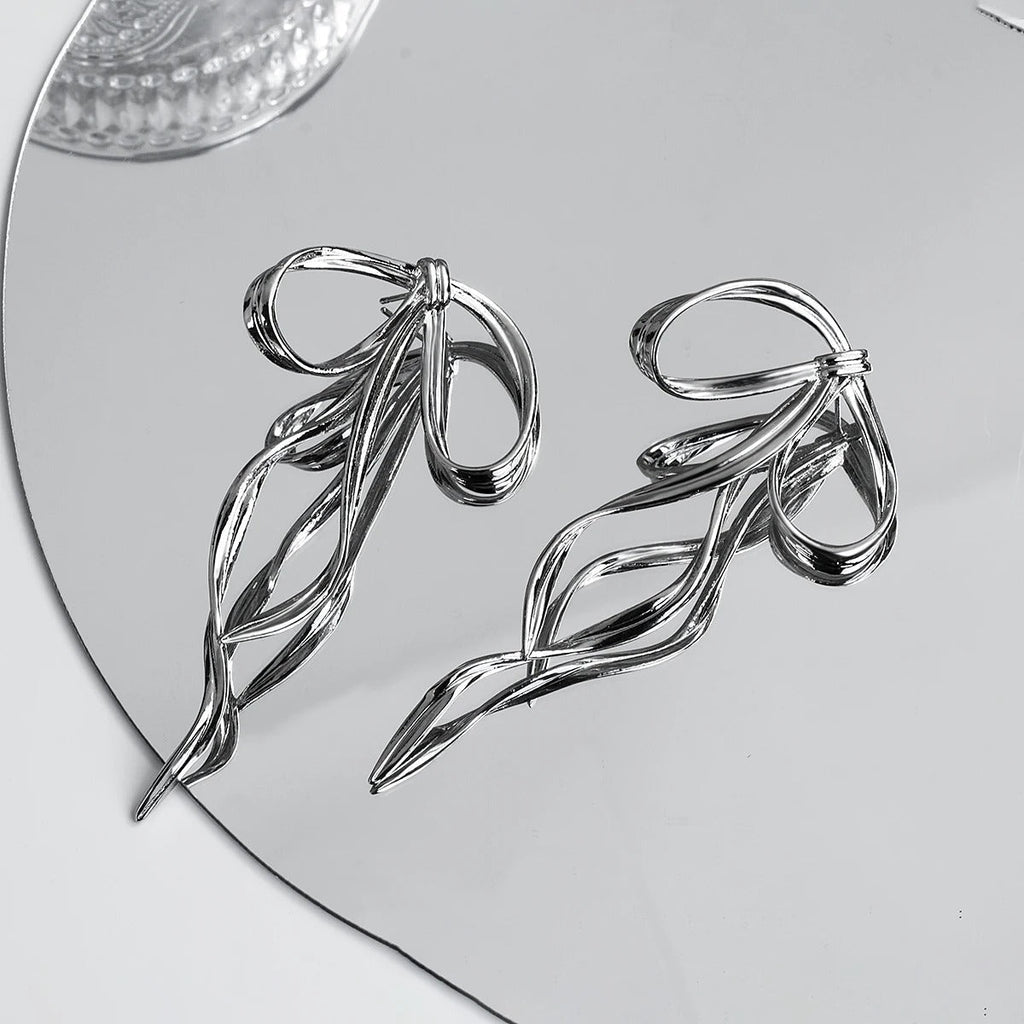 Carmiora - Raffinesse Schleifenknoten-Ohrringe