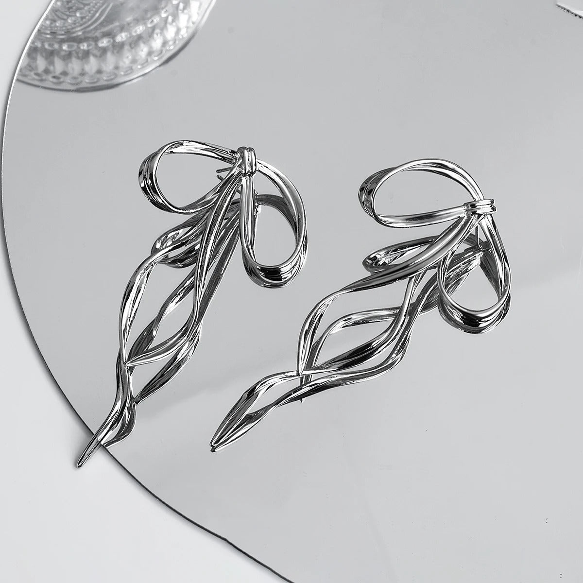 Carmiora - Raffinesse Schleifenknoten-Ohrringe