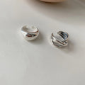 Carmiora - Regentropfen Design Kreuz Ring