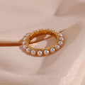 Eleganter runder Perlenring