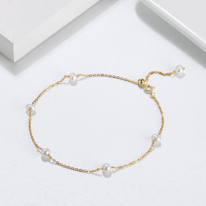 Elegante minimalistische Armbandkollektion mit Barockperlen