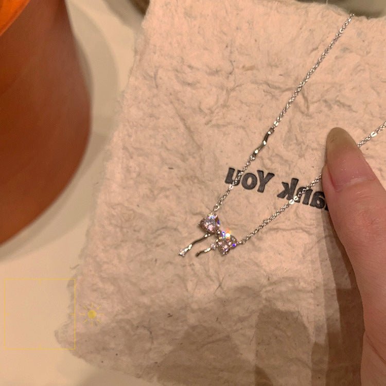 Halskette mit rosa Schleife