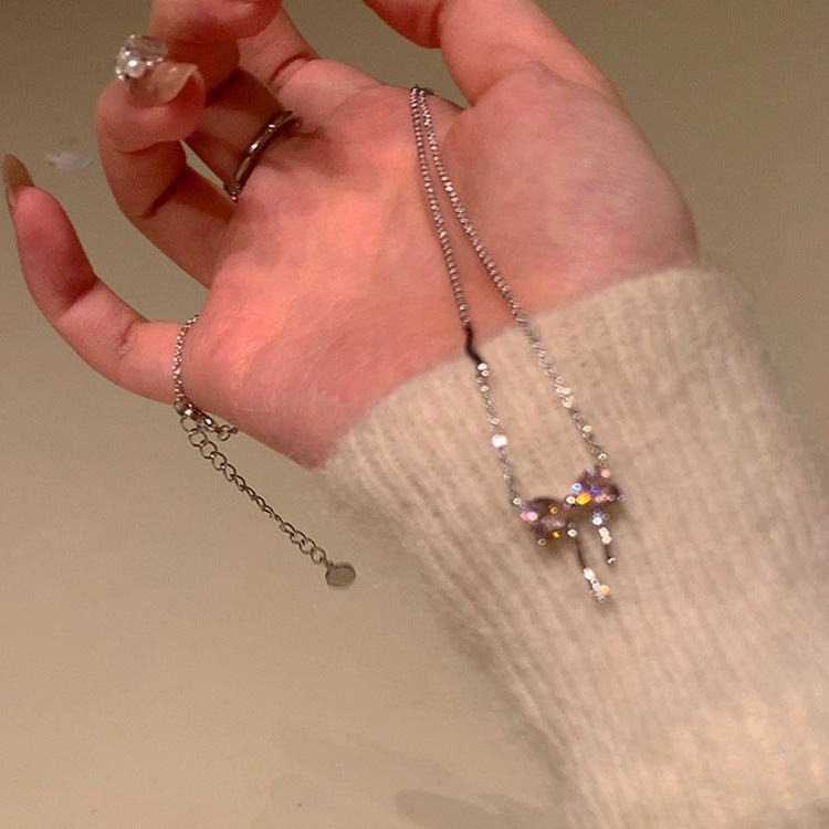 Halskette mit rosa Schleife