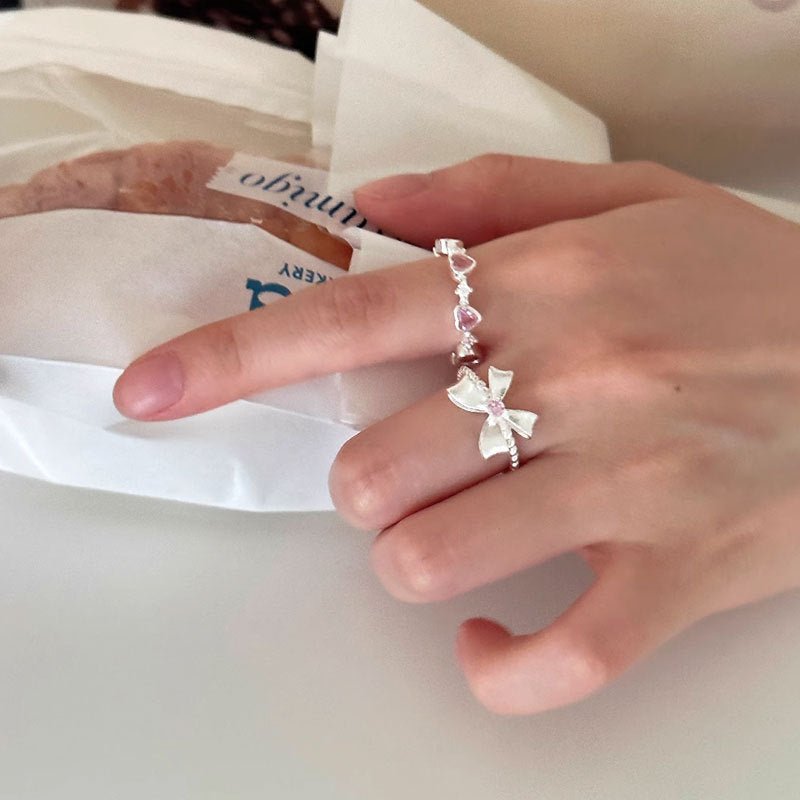 Schleifenring mit rosa Edelstein (massives Silber)