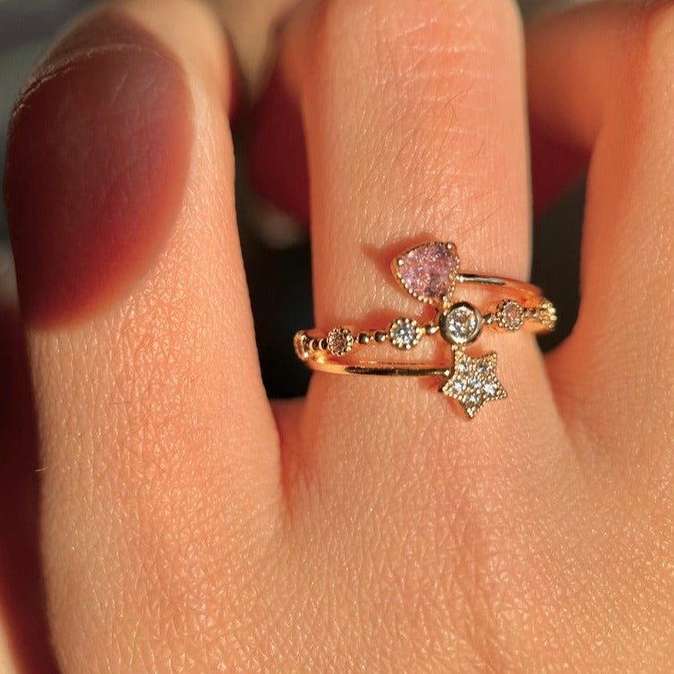 Rosa Ring mit Herz und Stern