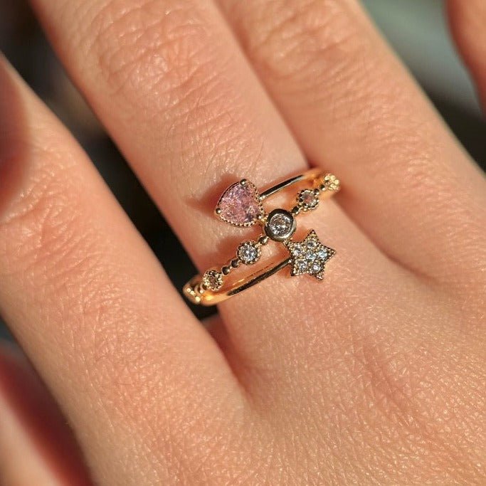 Rosa Ring mit Herz und Stern
