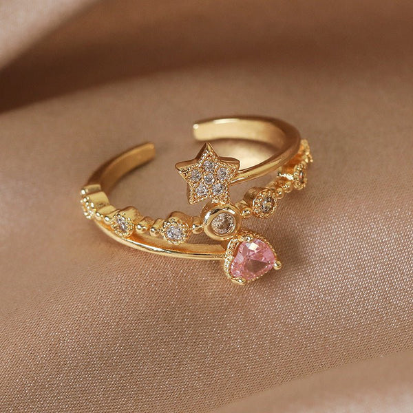 Rosa Ring mit Herz und Stern